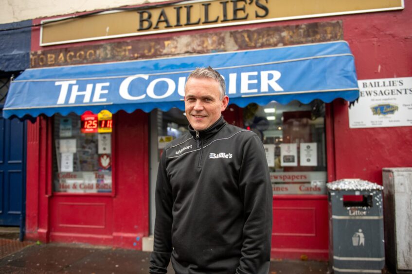 Ewan Baillie outside his newsagent shop in Perth city centre