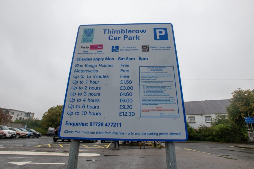 Sign with list of charges by the hour for Thimblerow car park, Perth