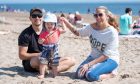 Adam Watt, Olivia Watt and Gemma Lindsay enjoying the sun at Broughty Ferry earlier this year. Image: Kim Cessford/DC Thomson