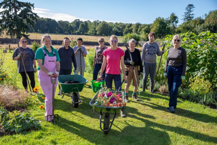 Former GP Louise with her team.