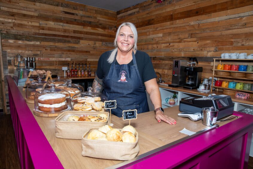 Kelly Duncan behind a counter with some the sweet treats on offer at the Fife business