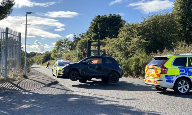 A car being removed from the scene of the crash in Kirkcaldy. Image: Neil Henderson/DC Thomson