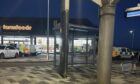 Police vans at Leven Bus Station.