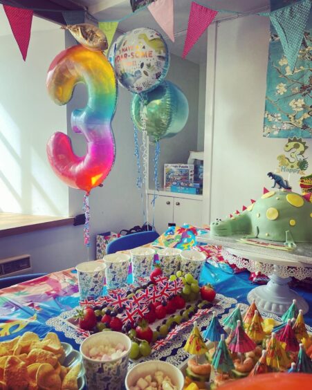 Image shows: a table at Little Neuk Storytelling Centre set up for a 3rd birthday party. For Courier party venues story.