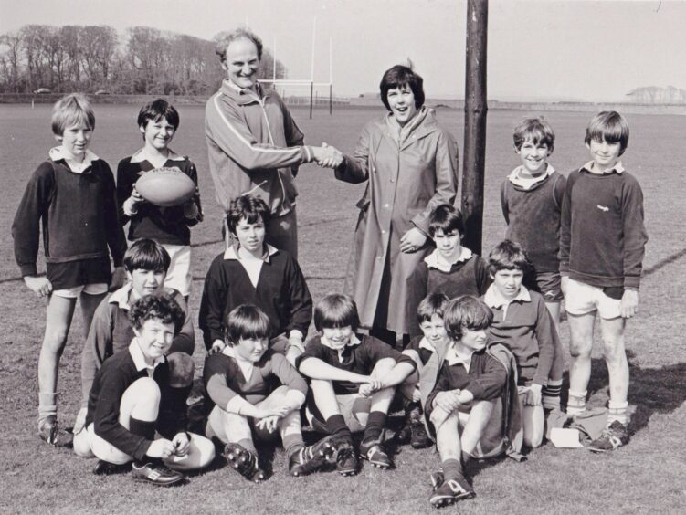 Andy with some of the minis at Madras Rugby Club at Station Park in St Andrews in 1982