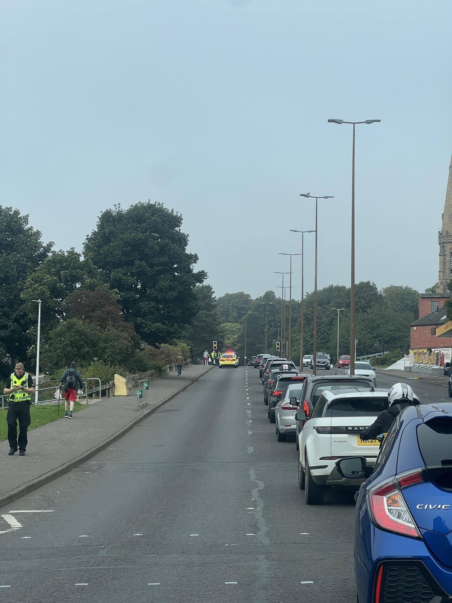 Traffic on Coupar Angus Road after the car was stopped.