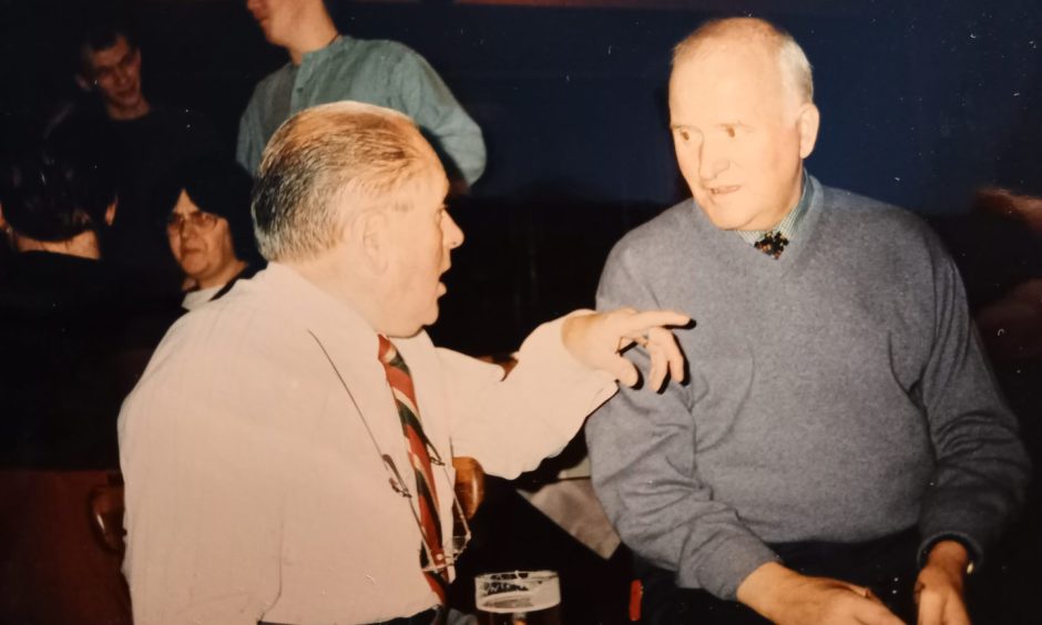 Former New Picture House chief projectionist Ian Collins (left), who was profoundly deaf, and manager Bill Munn at Bill's retiral in 1998. 