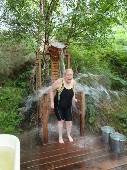 Debbie tried the waterfall bucket shower at Nowhere Sauna in Perthshire. 