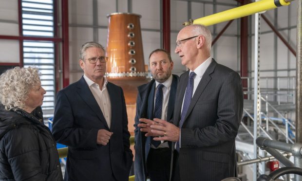 Scottish secretary Ian Murray (second from right) said all previous promises were under review. Image: PA