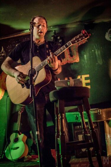 Brian Harkin on stage