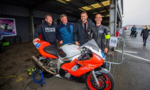 Left to right is Michael Robertson, William Lawson alongside team mates William Lawson Jr and Pat Clements, part of the Star Hotel Racing team from Auchterader in the CB500/Lightweight/Pre-Injection race. Image: Steve MacDougall/DC Thomson