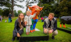 Luca (aged 1) with mum Joanne McVey and dad Ryan Murphy from Dundee, in front of ''Patch McCoo'' (artist Sandra Russell). Image: Steve MacDougall/DC Thomson