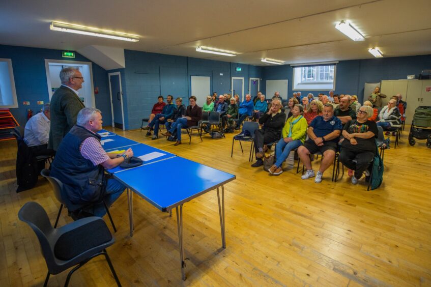 Public meeting, with room full of around 50 people at the White Church community venue in Comrie