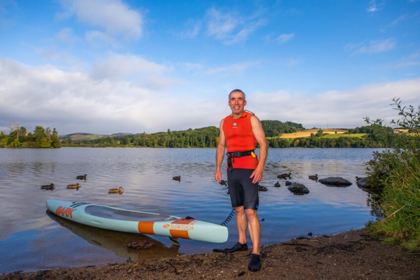 Dean enjoys early morning prone board training sessions at Clunie Loch.