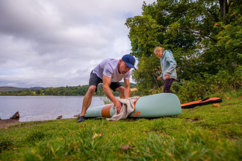 Dean and Rhona get ready to train at Clunie Loch.