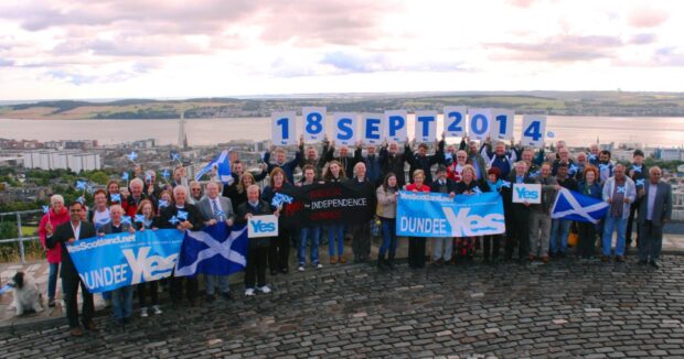 SNP activists hold a rally on Dundee Law to mark the one-year countdown to the Scottish independence referendum