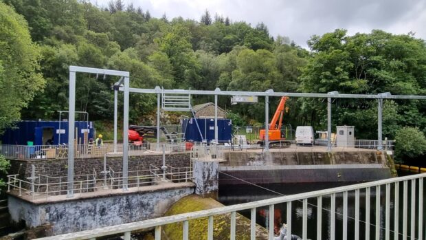 Large metal structure over river in St Fillans