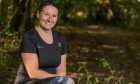 Parkrun tourist Claire Doak, wearing a Parkrun t-shirt.