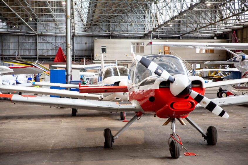 hangar full of planes at Perth airport