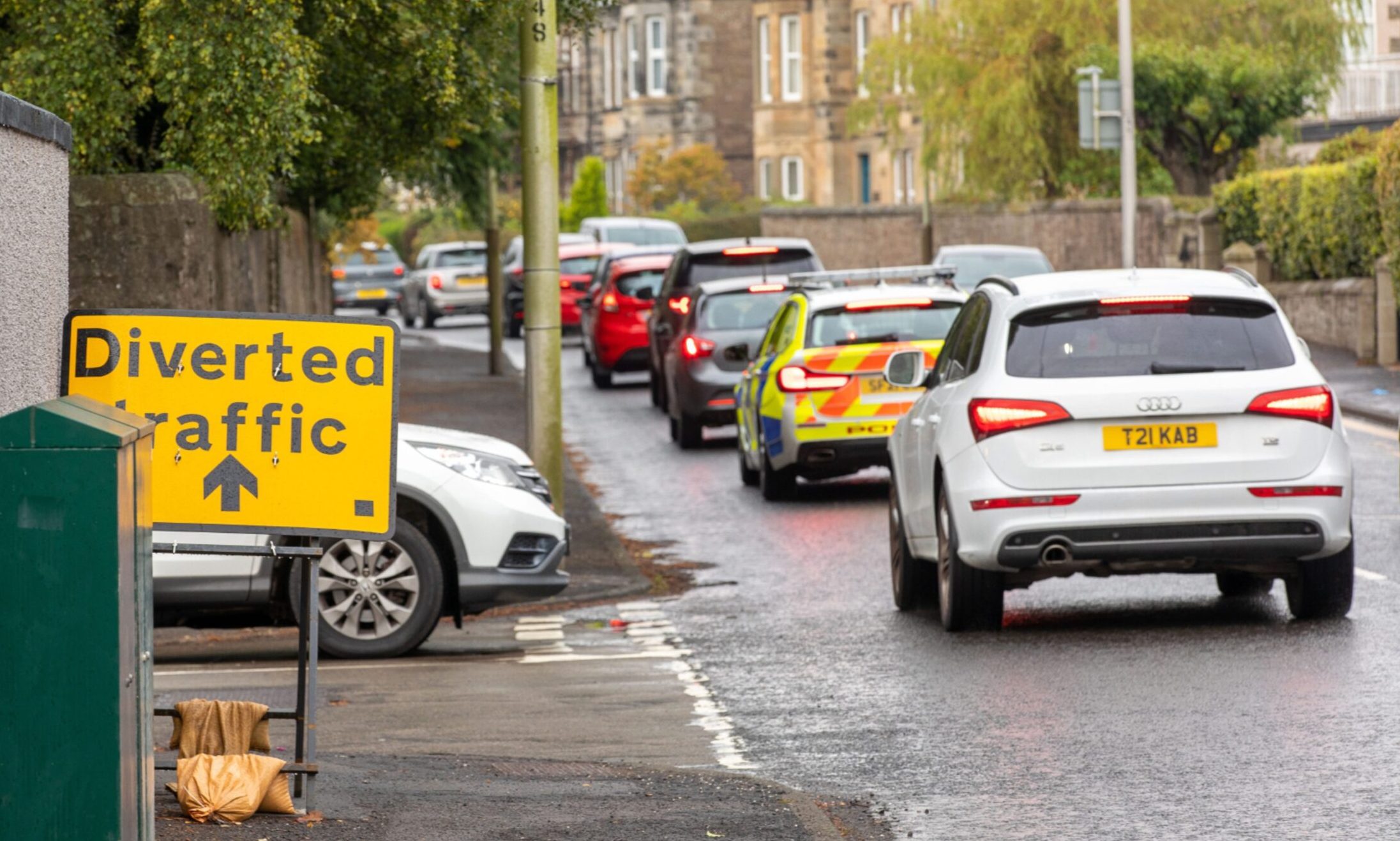 Drivers following a diversion on Strathern Road. Image: Brown/DC Thomson