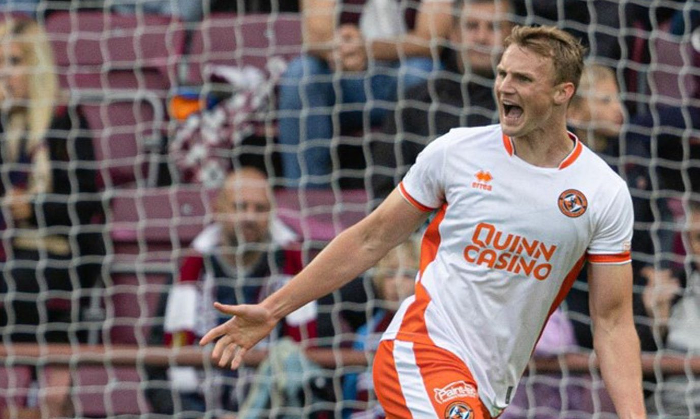 Sam Dalby celebrates helping Dundee United to a 1-0 victory against Hearts