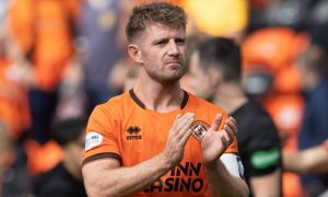 Ross Docherty salutes the Dundee United fans