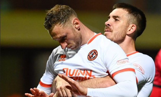 Dundee United's Louis Moult's celebration after scoring against Motherwell