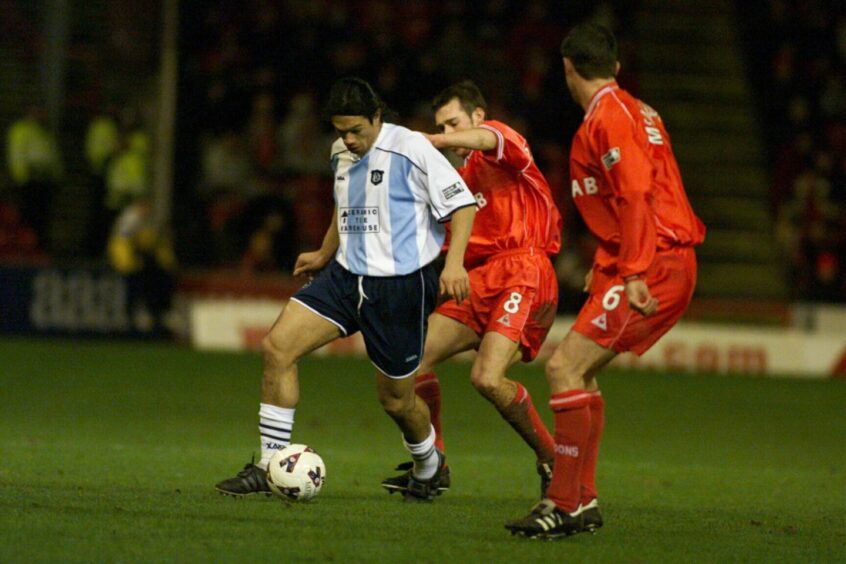 Caballero is closed down against Aberdeen in January 2002. 