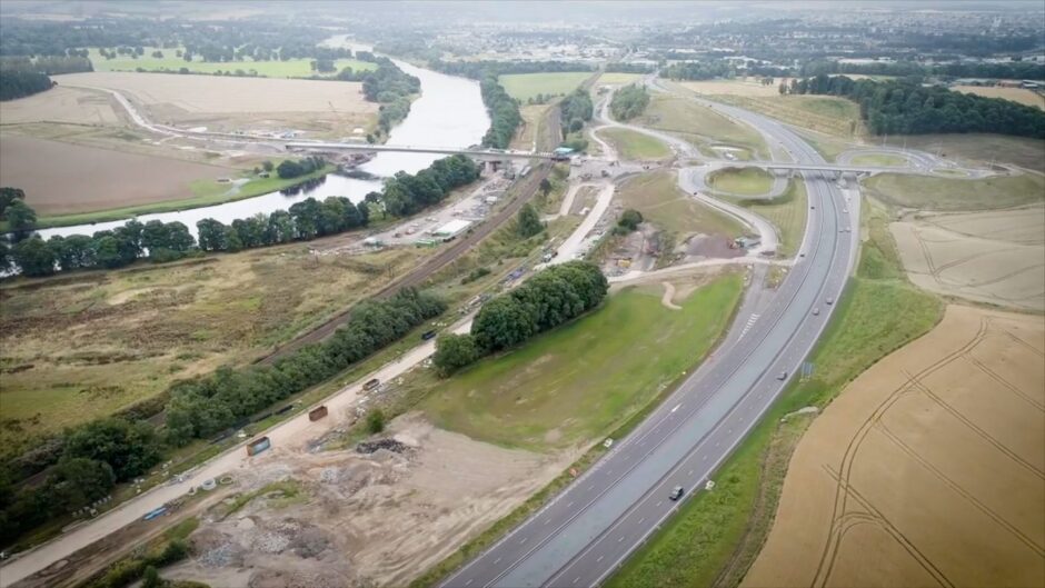 Drone image showing A9, Destiny Bridge, Cross Tay Link road and Perth beyond