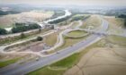 Aerial view, showing roads connecting the A9 to the new Destiny Bridge across River Tay and the Cross Tay Link Road beyond.