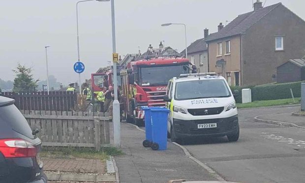 Emergency crews at the scene of the house fire on Tweed Street on Dunfermline