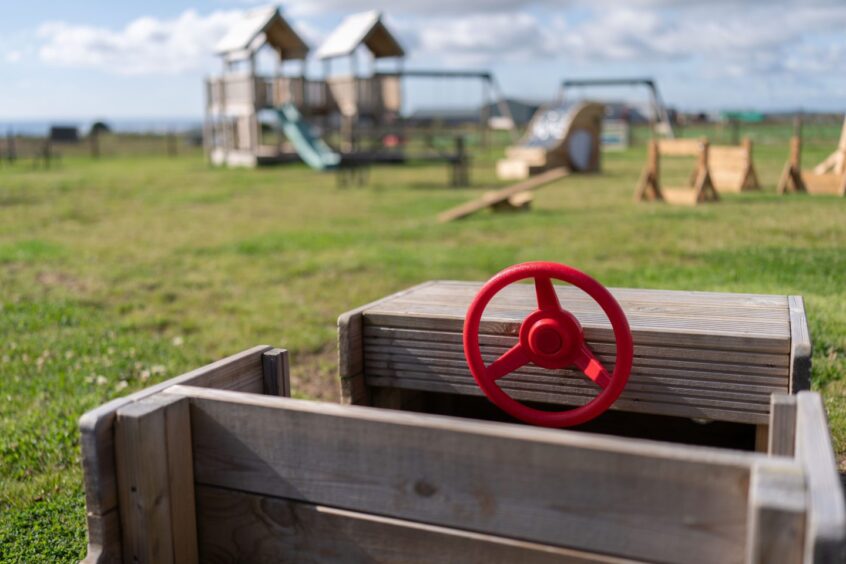 wooden cart on grass