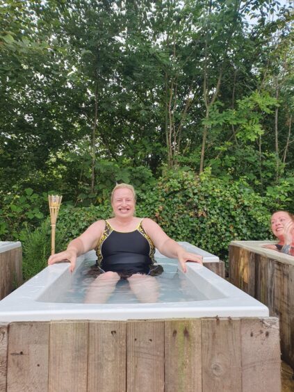 Debbie tried the cold water plunge bath at Viking Heat Retreat. 