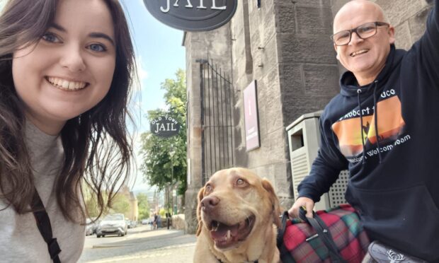 Cody the three-year-old fox hound wears many hats - therapy dog for Jade, best friend for her daughter Kayla, and protector of the home. Image: Kenny Smith.