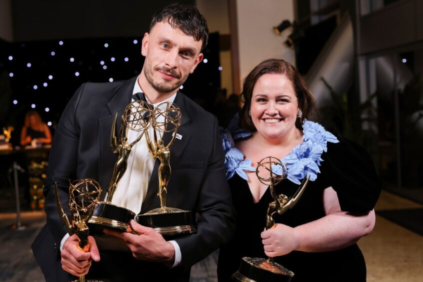 Gadd and his co-star Jessica Gunning holding their Emmy Awards