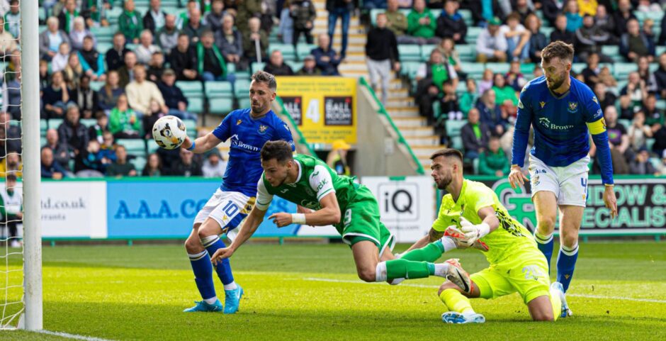 Kyle Cameron watches as Hibs take the lead against St Johnstone.