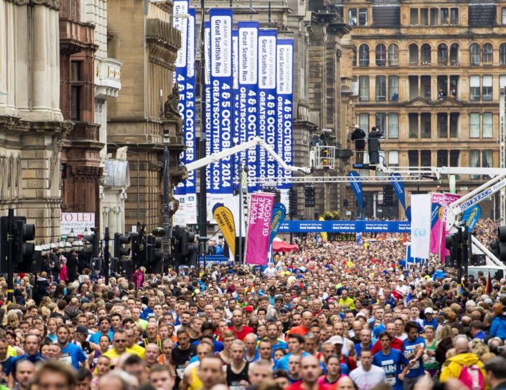 The 2014 Great Scottish Run sets off from George Square in Glasgow.