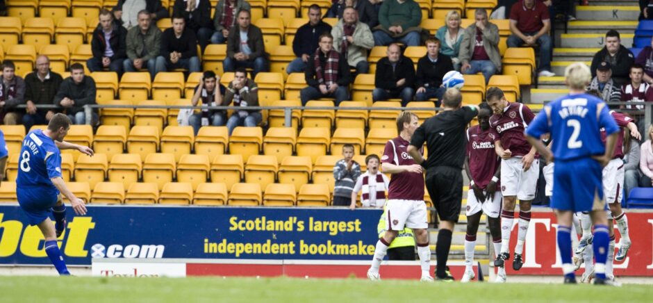 Martin Hardie curls home a free-kick against Hearts.