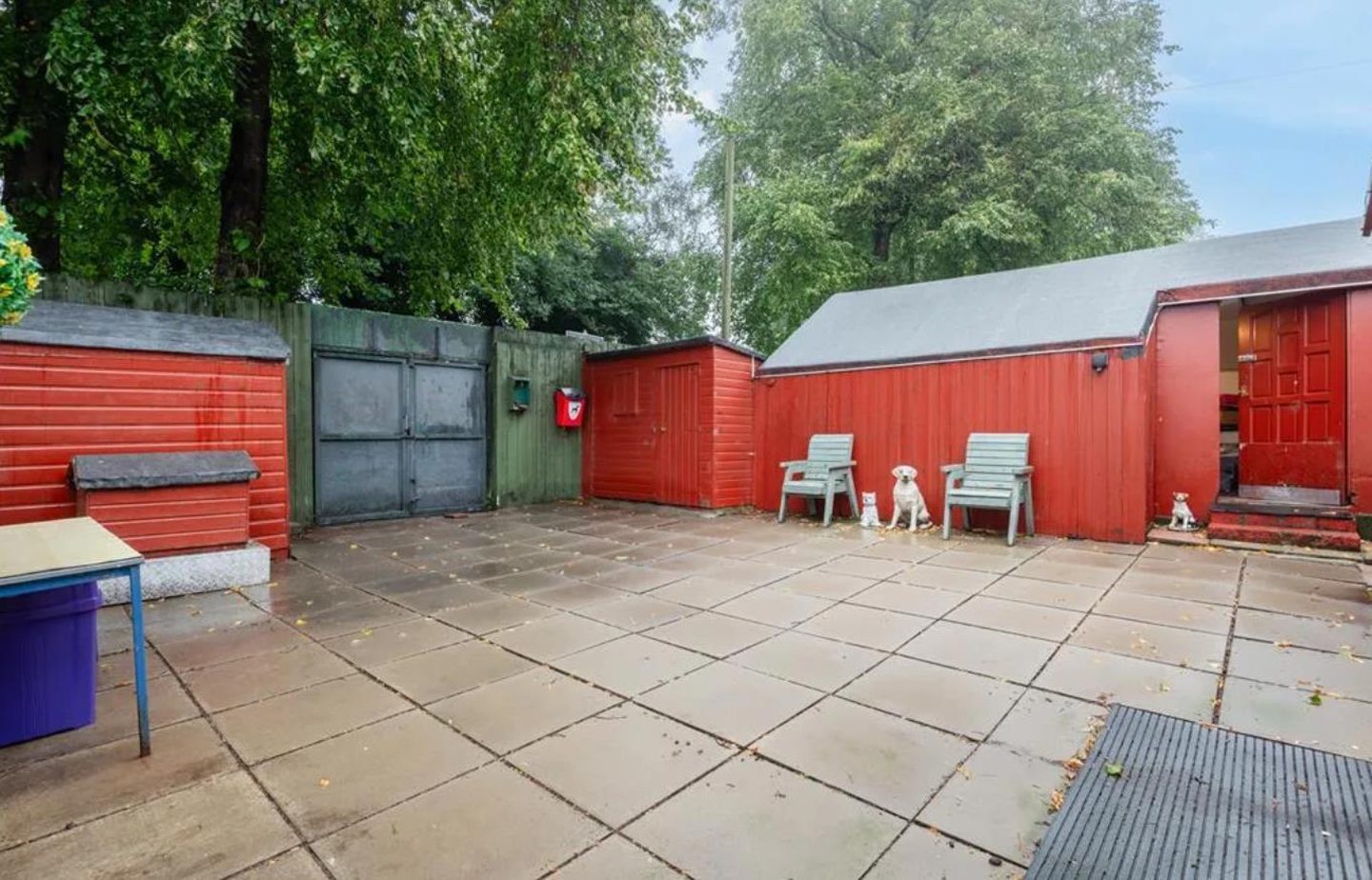 Metal gates keep the kennels secure.