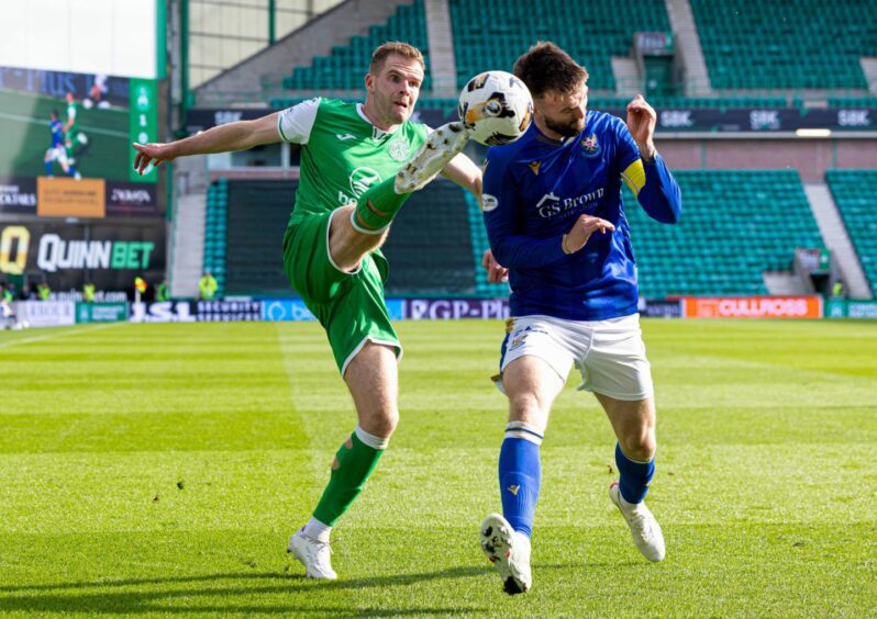 Kyle Cameron blocks a cross. 