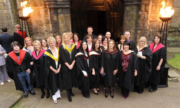 Carnegie College students outside Dunfermline Abbey in 2009.