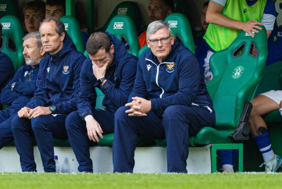 A dejected St Johnstone coaching staff.