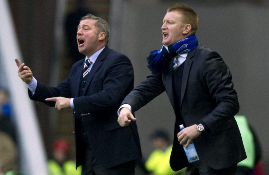 Steve Lomas at Ibrox, with Ally McCoist in the background. 