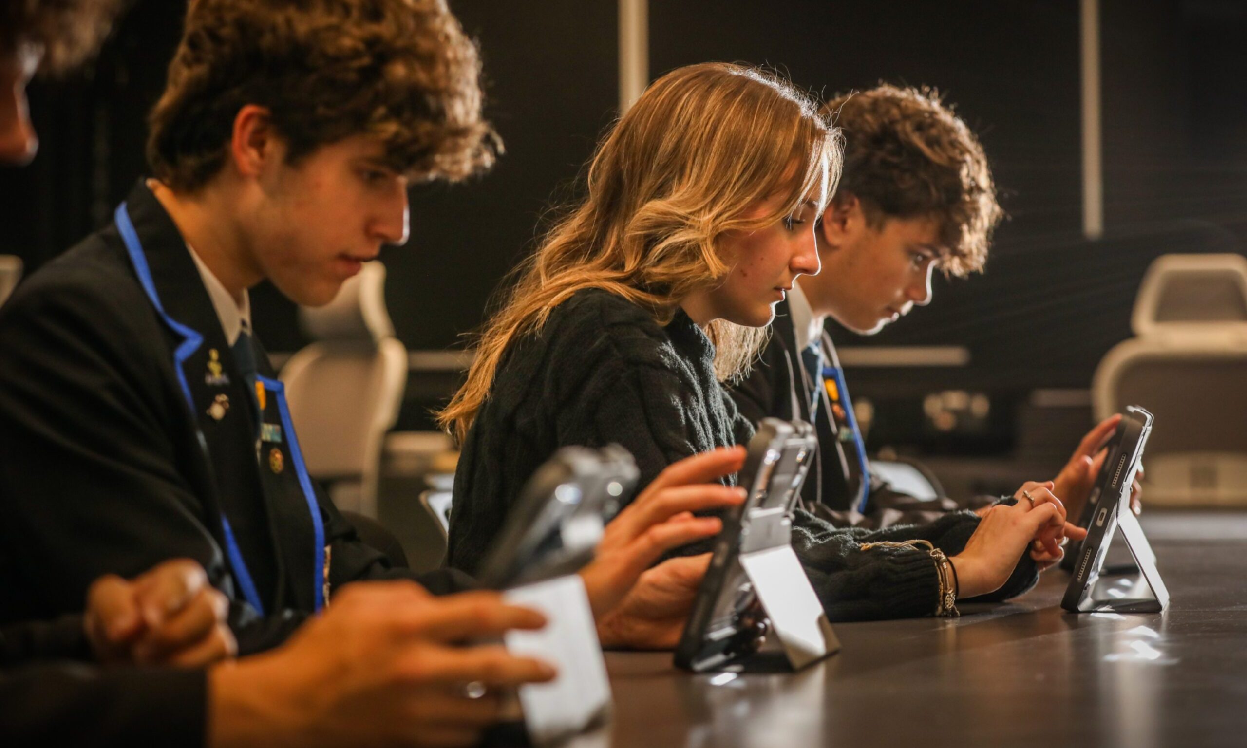 Woodmill High School pupils Hannah McRitchie, 16, and George Foxlow, 17, try out the iPads which could be distributed. Image Mhairi Edwards/DC Thomson.