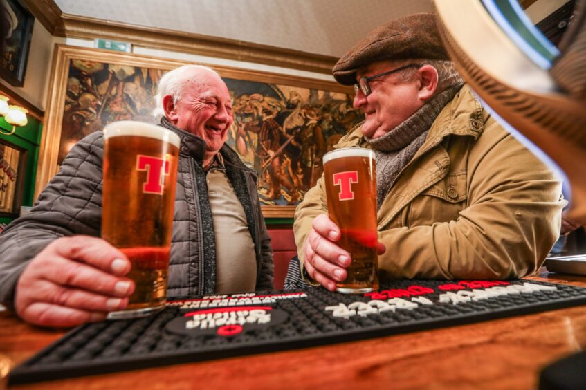 Dundee beer fans Russell Jemine and Ross Farmer don't support the concept of shrinking pint sizes.