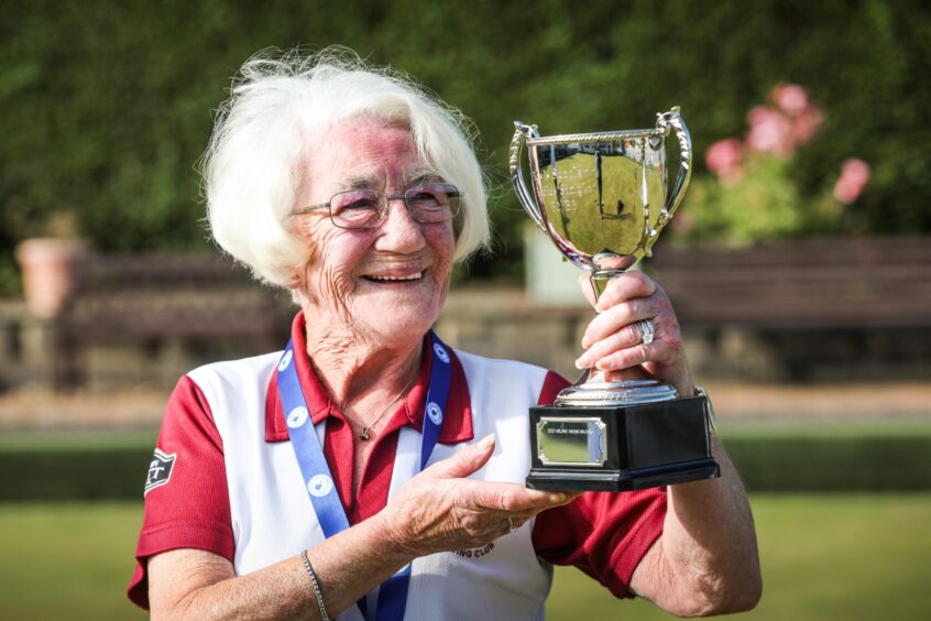 Sylvia, from Dundee, won a trophy and gold medal after winning a bowls competition.