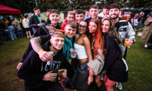 Piling in for a big group shot. Image: Mhairi Edwards/DC Thomson