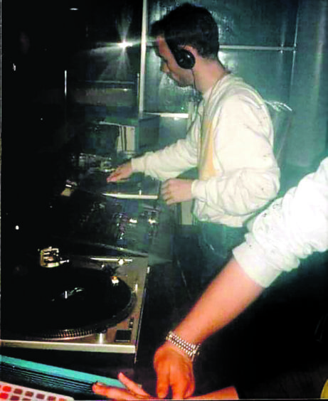 Moby behind the decks while performing at Lido Nightclub in Kirkcaldy.