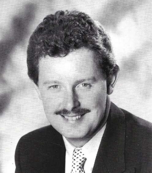 A head and shoulders shot of a young Dougie Donnelly