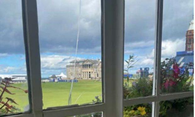 A large crack in the window at Rusacks Hotel overlooking St Andrews Old Course